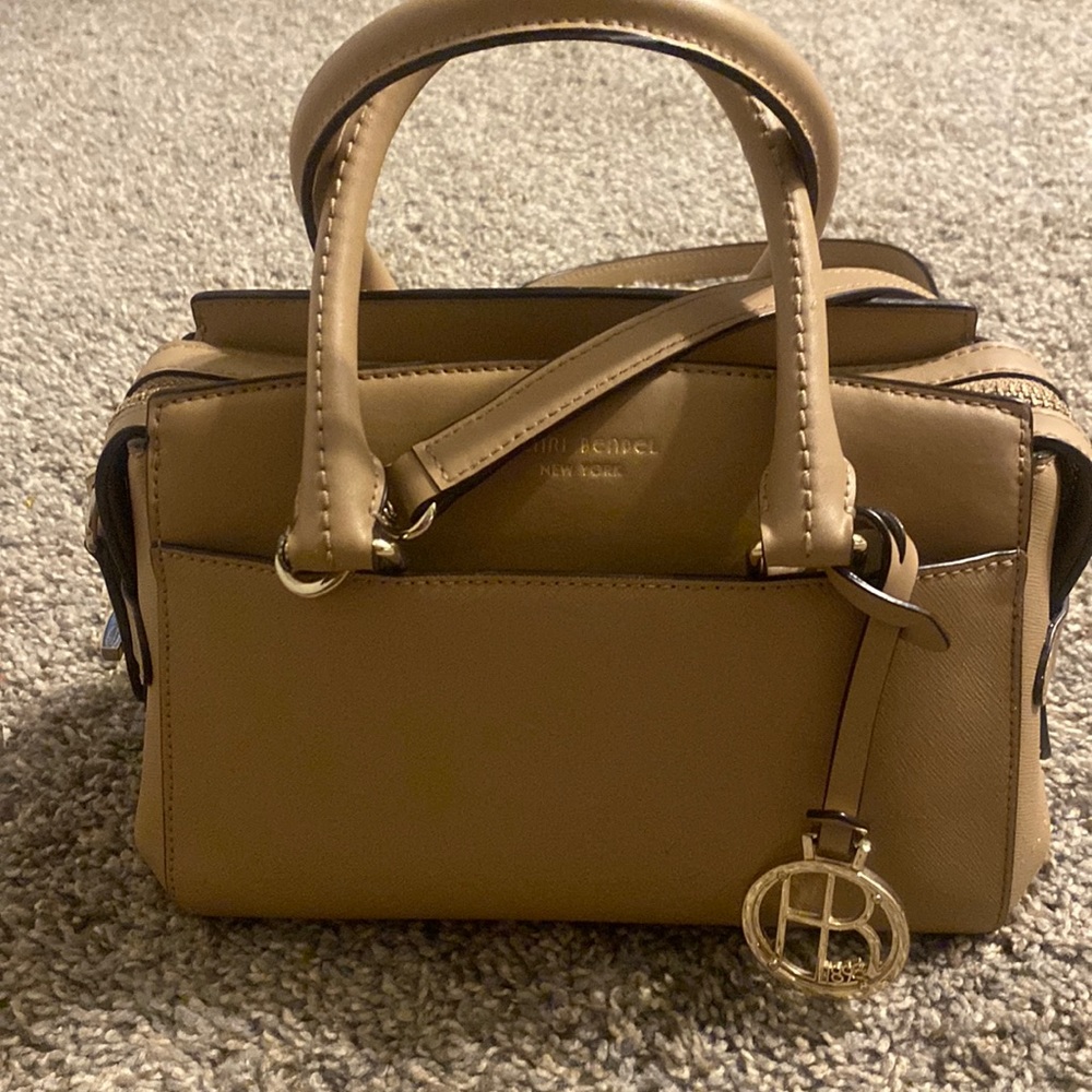 Brand new henri bendel handbag, worn once, kept in dust bag, clean